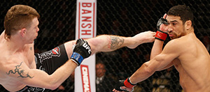 Felder kicks Danny Castillo in their bout during UFC 182 on January 3, 2015 in Las Vegas, NV. (Photo by Josh Hedges/Zuffa LLC)