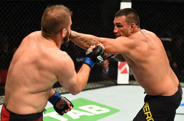 SYDNEY, AUSTRALIA - NOVEMBER 19: (R-L) Fabricio Werdum of Brazil punches Marcin Tybura of Poland in their heavyweight bout during the UFC Fight Night event inside the Qudos Bank Arena on November 19, 2017 in Sydney, Australia. (Photo by Josh Hedges/Zuffa LLC/Zuffa LLC via Getty Images)
