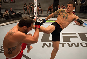 Cesar Arzamendia kicks Oliver Meza during the filming of The Ultimate Fighter Latin America: Team Gastelum vs Team Escudero on March 24, 2015 in Las Vegas, NV. (Photo by Brandon Magnus/Zuffa LLC)