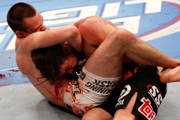Krause submits a bloody Stout Krause submits a bloody Stout