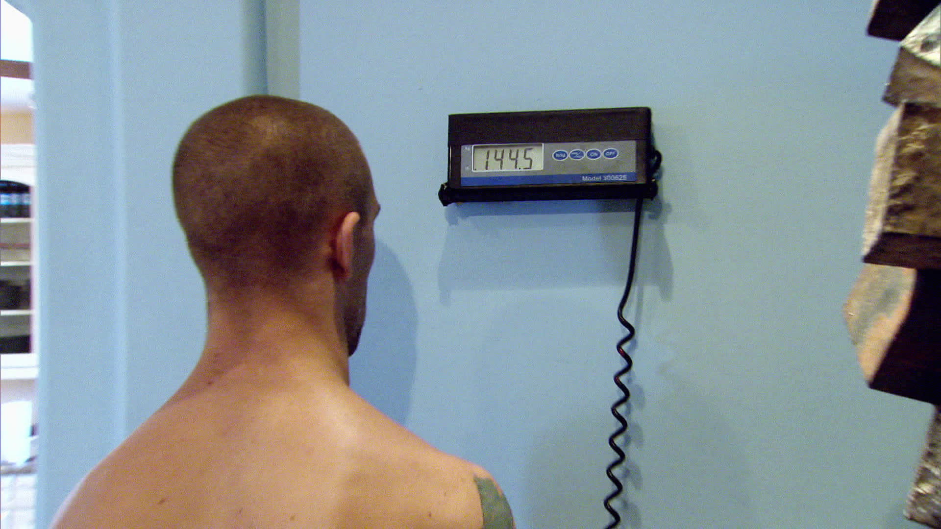 Cody on the dreaded scale Cody on the dreaded scale