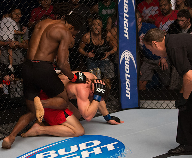 Jason Jackson knees Michael Graves during the filming of The Ultimate Fighter: American Top Team vs Blackzilians. (Photo by Chris Trotman/Zuffa LLC)