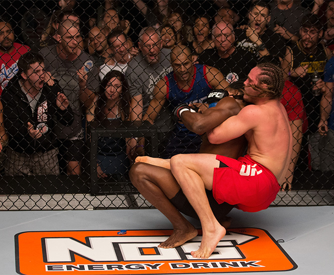 Michael Graves controls the body of Jason Jackson during the filming of The Ultimate Fighter: American Top Team vs Blackzilians. (Photo by Chris Trotman/Zuffa LLC)