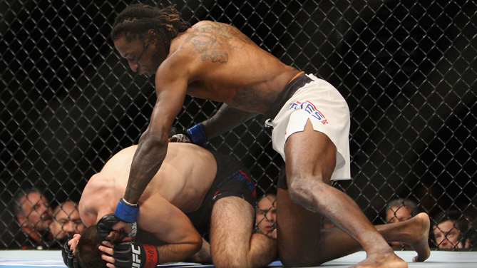 Willie Gates (top) punches Darrell Montague in their flyweight bout during the Ultimate Fighter Finale inside MGM Grand Garden Arena on July 12, 2015 in Las Vegas, Nevada. (Photo by Mitch Viquez/Zuffa LLC)