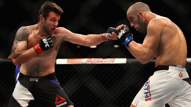 Jerrod Sanders punches Russell Doane in their bantamweight bout during the Ultimate Fighter Finale inside MGM Grand Garden Arena on July 12, 2015 in Las Vegas, Nevada. (Photo by Brandon Magnus/Zuffa LLC)