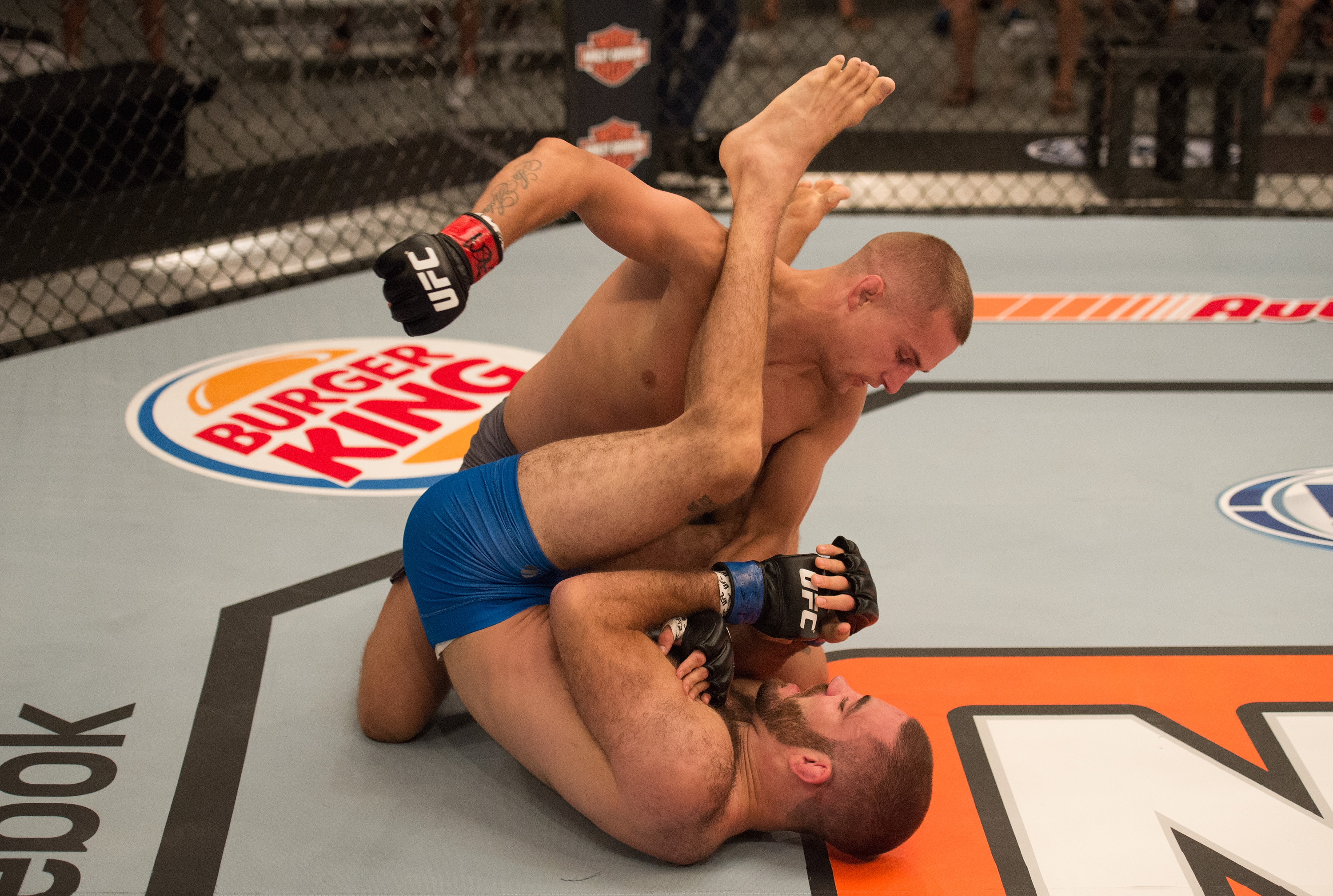 Marcin Wrzosek (top) punches Tom Gallicchio during the filming of The Ultimate Fighter: Team McGregor vs Team Faber at the UFC TUF Gym on July 30, 2015 in Las Vegas, Nevada. (Brandon Magnus/Zuffa LLC)