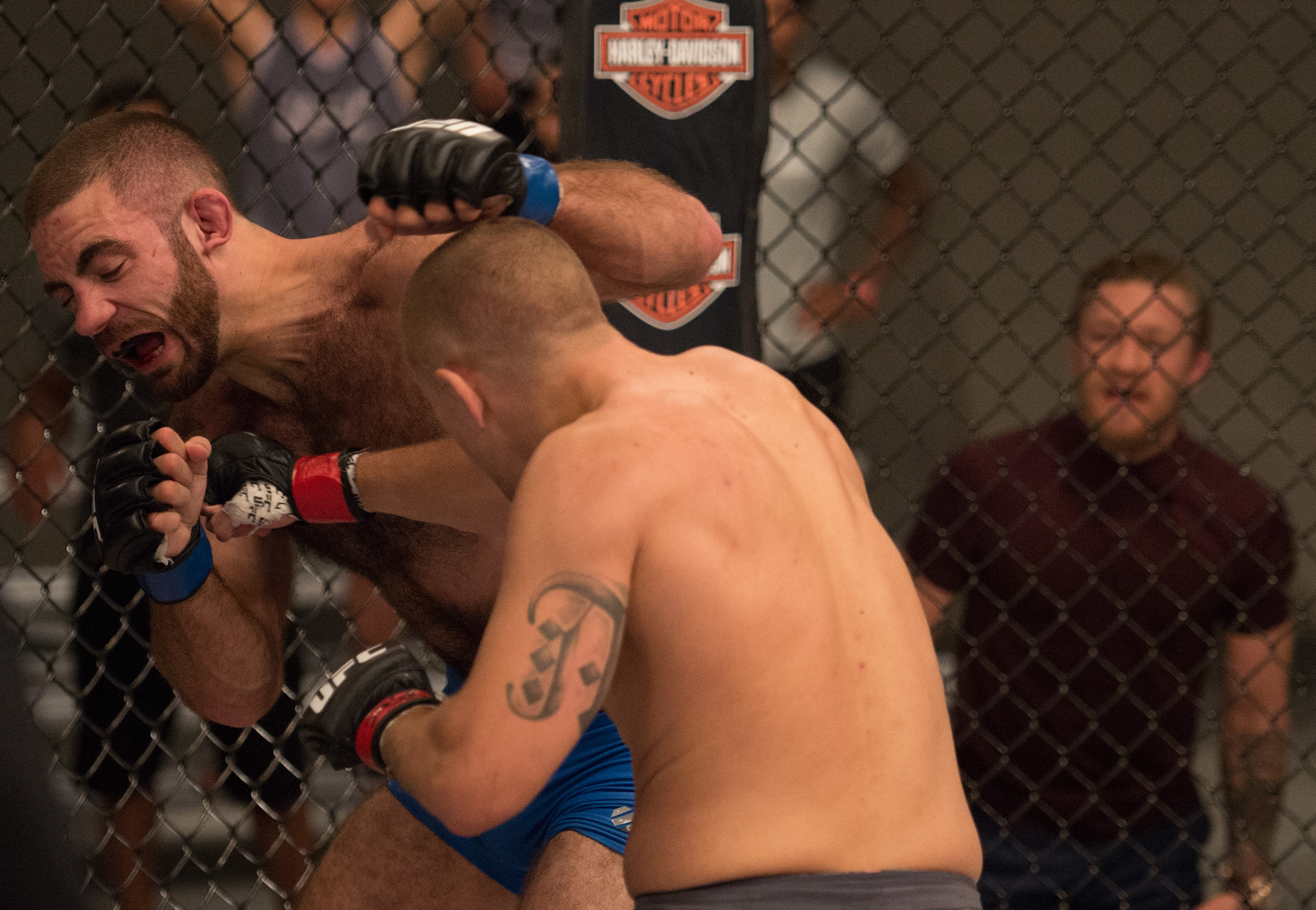 (R-L) Marcin Wrzosek punches Tom Gallicchio during the filming of The Ultimate Fighter: Team McGregor vs Team Faber at the UFC TUF Gym on July 30, 2015 in Las Vegas, Nevada. (Brandon Magnus/Zuffa LLC)