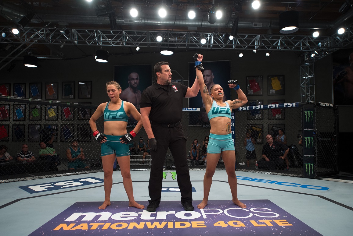 Sijara Eubanks celebrates after her fight against Deanna Bennett