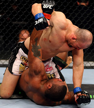 Glover Teixeira (Top) fights <a href='../fighter/Quinton-Jackson'>Rampage Jackson</a> (Bottom) during their Light Heavyweight Bout part of UFC on FOX at United Center on January 26, 2013 in Chicago, Illinois. (Photo by Al Bello/Zuffa LLC)