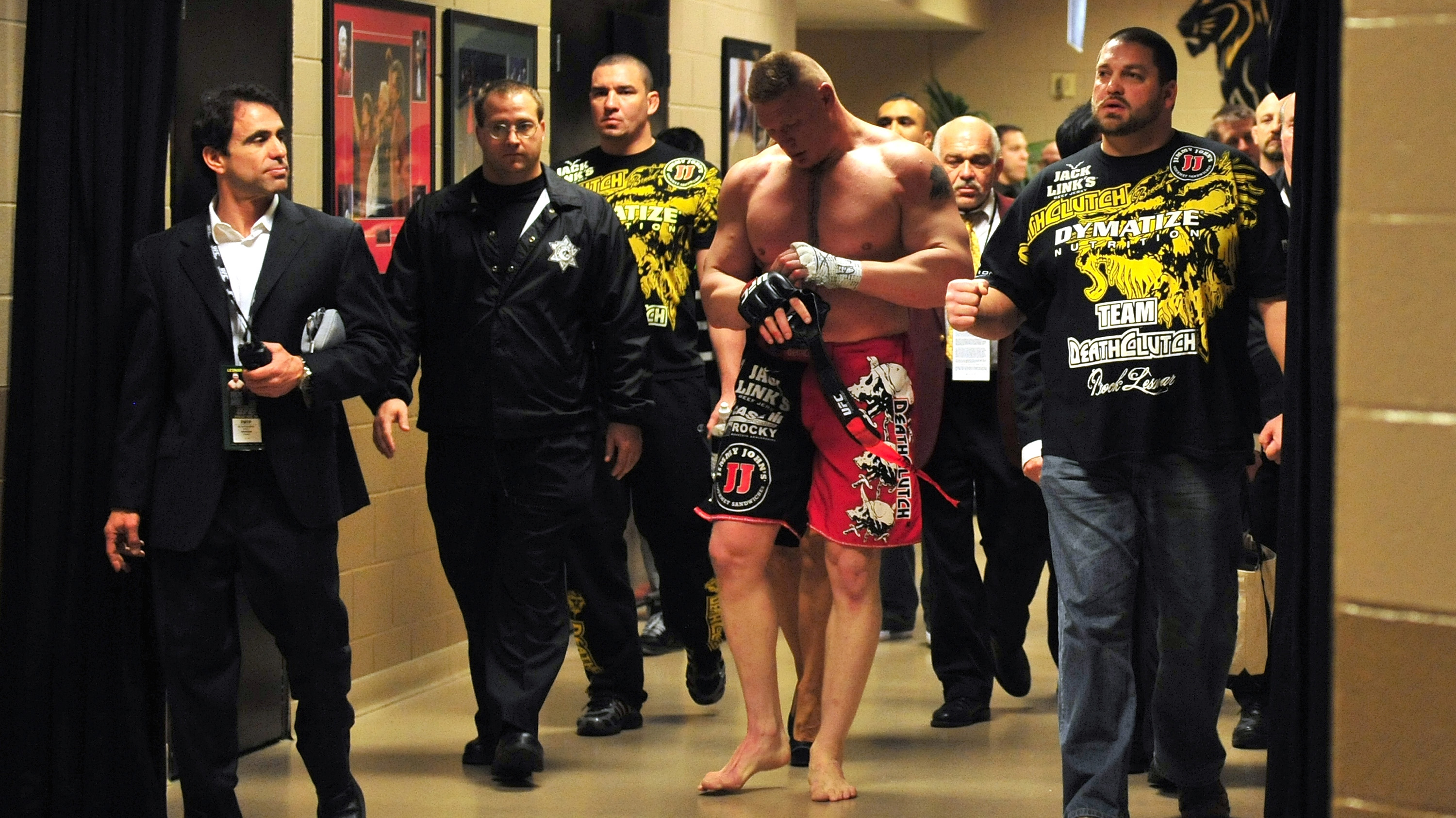 Brock Lesnar walks back to his locker room after announcing his retirement after his loss to Alistair Overeem during UFC 141 on December 30, 2011 (Photo by Kari Hubert/Zuffa LLC/Zuffa LLC via Getty Images)