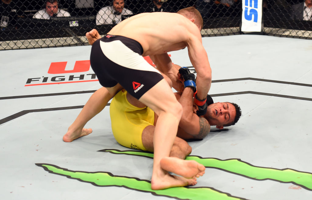 AUCKLAND, NEW ZEALAND - JUNE 11: (L-R) Ion Cutelaba of Moldova punches Henrique da Silva of Brazil in their light heavyweight fight during the UFC Fight Night event at the Spark Arena on June 11, 2017 in Auckland, New Zealand. (Photo by Josh Hedges/Zuffa LLC)