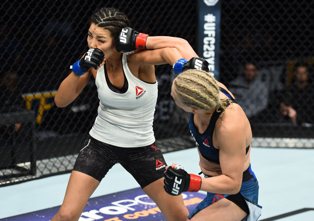 CHARLOTTE, NC - JANUARY 27: (R-L) Justine Kiss punches Ji Yeon Kim of South Korea in their women's flyweight bout during a UFC Fight Night event at Spectrum Center on January 27, 2018 in Charlotte, North Carolina. (Photo by Josh Hedges/Zuffa LLC)