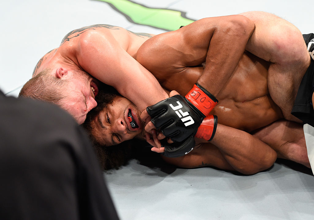 DENVER, CO - JANUARY 28: (L-R) Jason Knight attempts to submit Alex Caceres in their featherweight bout during the UFC Fight Night event at the Pepsi Center on January 28, 2017 in Denver, Colorado. (Photo by Josh Hedges/Zuffa LLC)