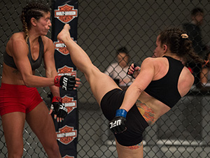 (R-L) Jodie Esquibel kicks Ashley Yoder during the elimination fights at the UFC TUF Gym on January 26, 2016 in Las Vegas, Nevada. (Photo by Brandon Magnus/Zuffa LLC)