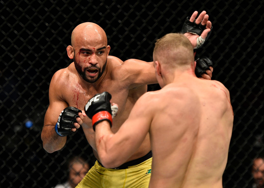 GDANSK, POLAND - OCTOBER 21: (L-R) Warlley Alves of Brazil punches Salim Touahri of Poland in their welterweight bout during the UFC Fight Night event inside Ergo Arena on October 21, 2017 in Gdansk, Poland. (Photo by Jeff Bottari/Zuffa LLC)