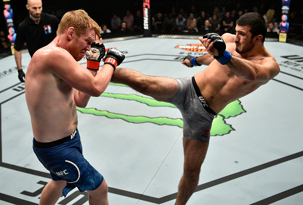 GDANSK, POLAND - OCTOBER 21: (R-L) Ramazan Emeev of Russia kicks Sam Alvey in their middleweight bout during the UFC Fight Night event inside Ergo Arena on October 21, 2017 in Gdansk, Poland. (Photo by Jeff Bottari/Zuffa LLC)