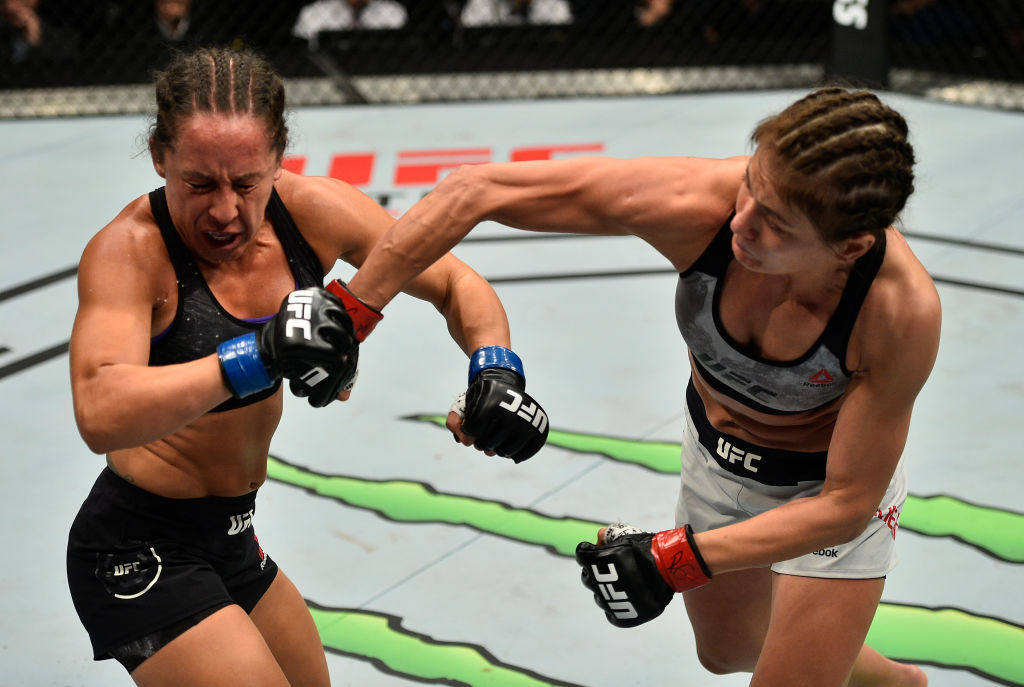 GDANSK, POLAND - OCTOBER 21: (R-L) Karolina Kowalkiewicz of Poland punches Jodie Esquibel in their women's strawweight bout during the UFC Fight Night event inside Ergo Arena on October 21, 2017 in Gdansk, Poland. (Photo by Jeff Bottari/Zuffa LLC)