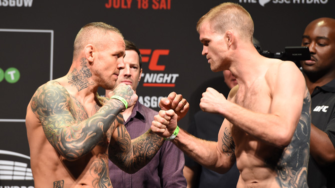 Opponents Ross Pearson of England and Evan Dunham of the United States face off during the UFC weigh-in inside the SSE Hydro on July 17, 2015 in Glasgow, Scotland. (Photo by Josh Hedges/Zuffa LLC)