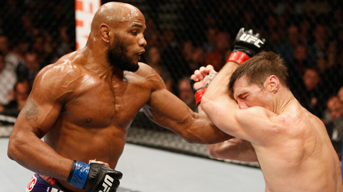 Yoel Romero punches Tim Kennedy in their middleweight fight during the UFC 178 event inside the MGM Grand Garden Arena on September 27, 2014 in Las Vegas, Nevada. (Photo by Josh Hedges/Zuffa LLC)