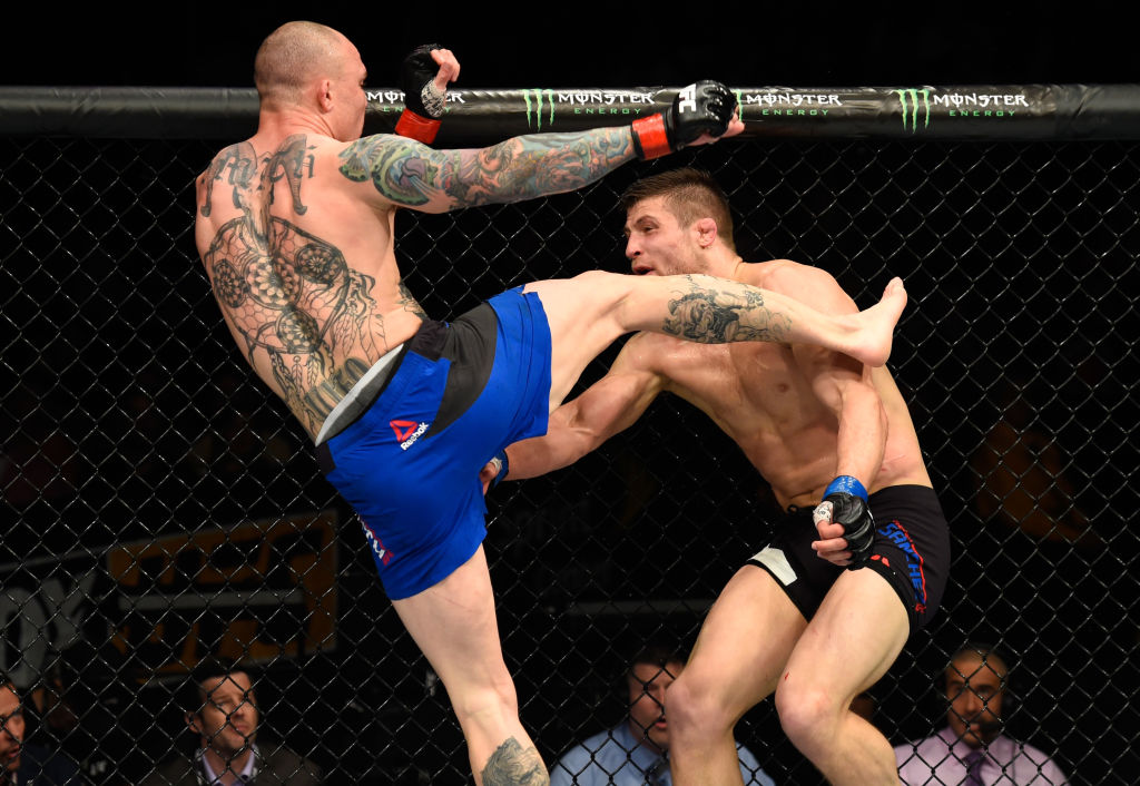 KANSAS CITY, MO - APRIL 15: (L-R) Anthony Smith kicks Andrew Sanchez in their middleweight fight during the UFC Fight Night event at Sprint Center on April 15, 2017 in Kansas City, Missouri. (Photo by Josh Hedges/Zuffa LLC)