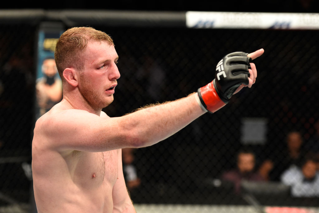 <a href='../fighter/Danny-Henry'>Danny Henry</a> raises his hand after facing <a href='../fighter/Daniel-Teymur'>Daniel Teymur</a> during the <a href='../event/UFC-Silva-vs-Irvin'>UFC Fight Night </a>on July 16, 2017 in Glasgow, Scotland. (Photo by Josh Hedges/Zuffa LLC)