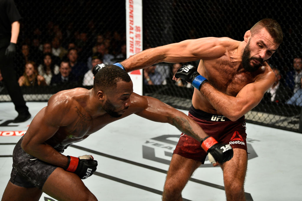 (L-R) Leon Edwards punches Peter Sobotta in their welterweight bout inside The O2 Arena on March 17, 2018 in London, England. (Photo by Brandon Magnus/Zuffa LLC)