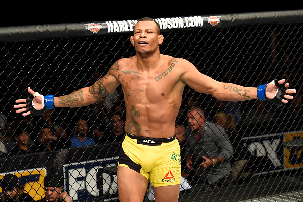 UNIONDALE, NY - JULY 22: Alex Oliveira of Brazil celebrates after defeating Ryan LaFlare in their welterweight bout during the UFC Fight Night event inside the Nassau Veterans Memorial Coliseum on July 22, 2017 in Uniondale, New York. (Photo by Josh Hedges/Zuffa LLC/Zuffa LLC via Getty Images)