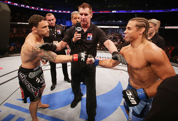 MANILA, PHILIPPINES - MAY 16: (L to R) Frankie Edgar of the United States and Uriah Faber of the United States touch gloves before their featherweight fight during the UFC Fight Night event at the Mall of Asia Arena on May 16, 2015 in Manila, Philippines. (Photo by Mitch Viquez/Zuffa LLC/Zuffa LLC via Getty Images)