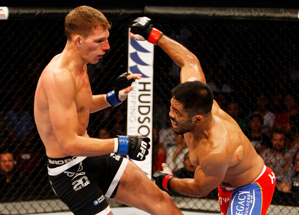MANILA, PHILIPPINES - MAY 16: Mark Munoz of the United States throws a punch at Luke Barnatt of England in their middleweight fight during the UFC Fight Night event at the Mall of Asia Arena on May 16, 2015 in Manila, Philippines. (Photo by Mitch Viquez/Zuffa LLC/Zuffa LLC via Getty Images)