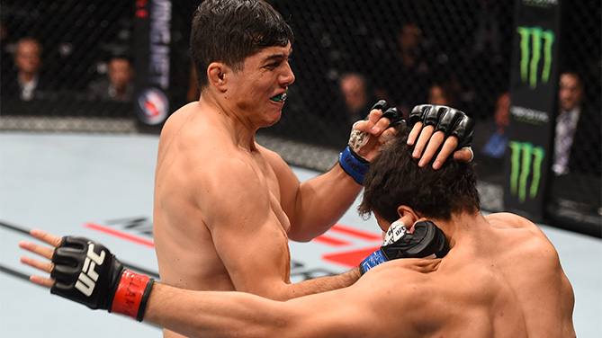 (L-R) Alvaro Herrera of Mexico knocks out Vernon Ramos of Panama in their welterweight bout during the UFC Fight Night event at Arena Monterrey on November 21, 2015 in Monterrey, Mexico. (Photo by Jeff Bottari/Zuffa LLC)