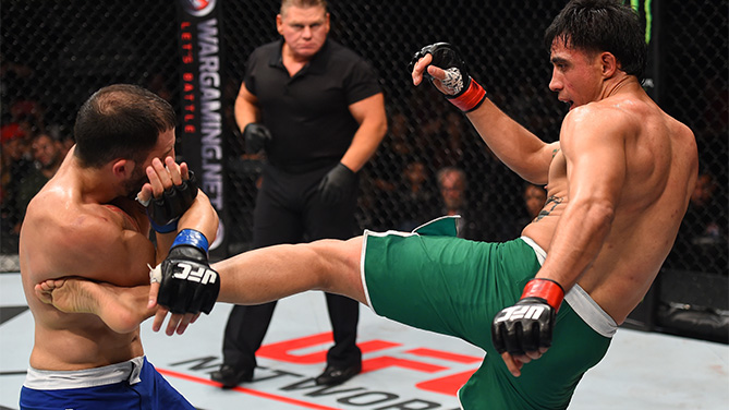 (R-L) Erick Montano of Mexico kicks Enrique Marin of Spain in their welterweight bout during the UFC Fight Night event at Arena Monterrey on November 21, 2015 in Monterrey, Mexico. (Photo by Jeff Bottari/Zuffa LLC)