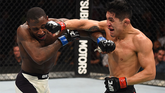 (R-L) <a href='../fighter/Erik-Perez'>Erik Perez</a> of Mexico and <a href='../fighter/taylor-lapilus'>Taylor Lapilus</a> of France trade punches in their bantamweight bout during the <a href='../event/UFC-Silva-vs-Irvin'>UFC Fight Night </a>event at Arena Monterrey on November 21, 2015 in Monterrey, Mexico. (Photo by Jeff Bottari/Zuffa LLC)