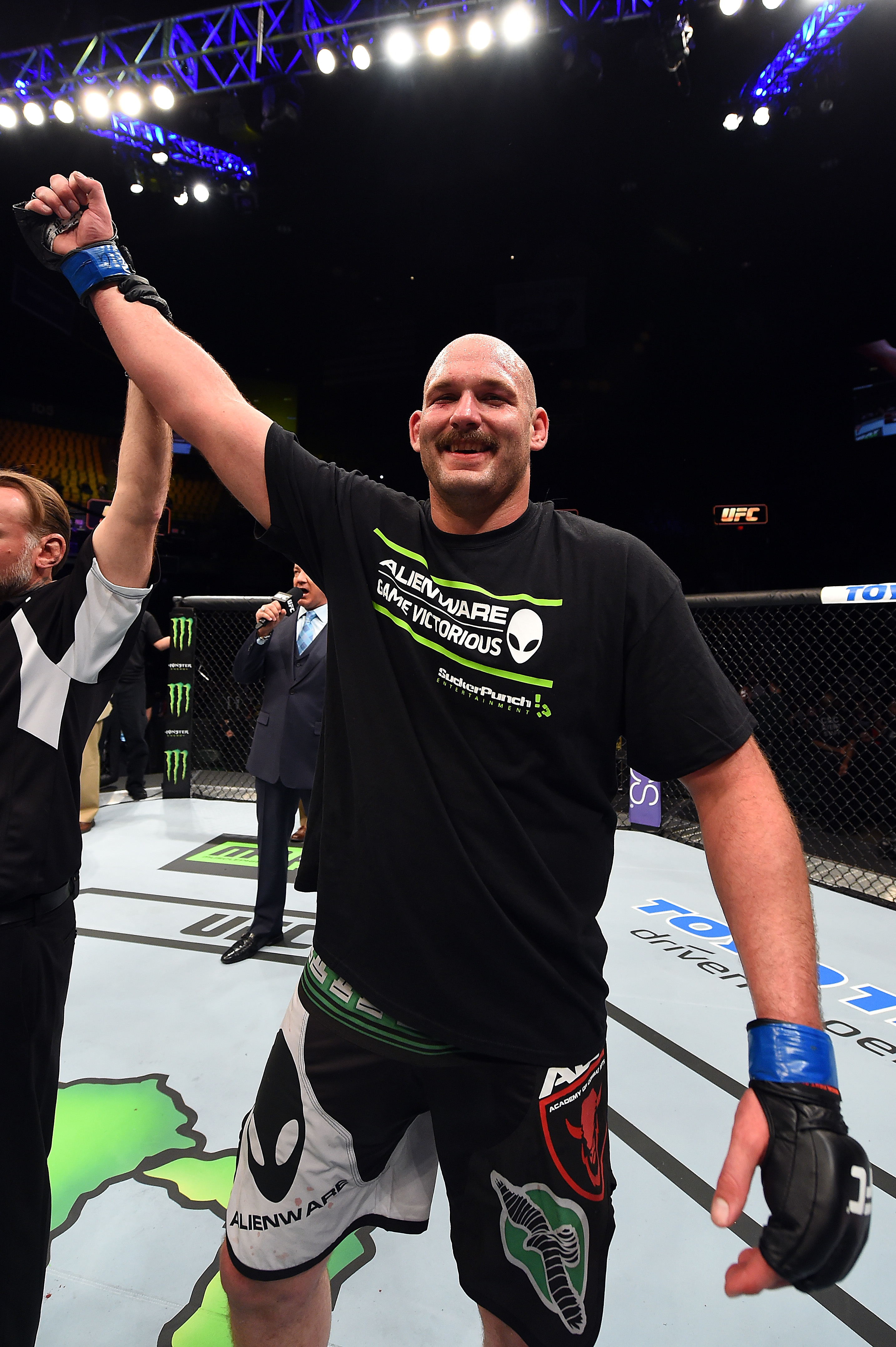 Timothy Johnson celebrates after defeating Shamil Abdurakhimov of Russia in their heavyweight fight during the UFC Fight Night event at the Patriot Center on April 4, 2015 in Fairfax, Virginia. (Photo by Josh Hedges/Zuffa LLC/Zuffa LLC via Getty Images)