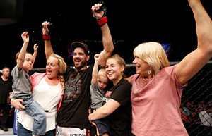 Matt Brown celebrates with his family after his TKO victory over <a href='../fighter/Erick-Silva'>Erick Silva</a> in their welterweight fight during the <a href='../event/UFC-Silva-vs-Irvin'>UFC Fight Night </a>event at the U.S. Bank Arena on May 10, 2014 in Cincinnati, OH. (Photo by Josh Hedges/Zuffa LLC)