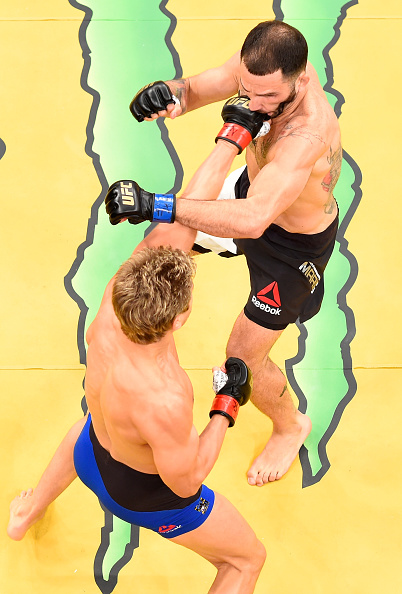 Sage Northcutt punches <a href='../fighter/enrique-marin'>Enrique Marin</a> of Spain in their lightweight bout during the UFC 200 event at T-Mobile Arena on July 9, 2016 in Las Vegas, NV (Photo by Josh Hedges/Zuffa LLC)