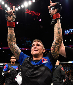 Dustin Poirier celebrates his victory over <a href='../fighter/Jim-Miller'>Jim Miller</a> in their lightweight bout during the UFC 208 event inside Barclays Center on February 11, 2017 in Brooklyn, New York. (Photo by Jeff Bottari/Zuffa LLC)