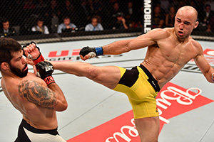 Marlon Moraes kicks <a href='../fighter/Raphael-Assuncao'>Raphael Assuncao</a> of Brazil in their bantamweight bout during the UFC 212 event at Jeunesse Arena on June 3, 2017 in Rio de Janeiro, Brazil. (Photo by Jeff Bottari/Zuffa LLC)