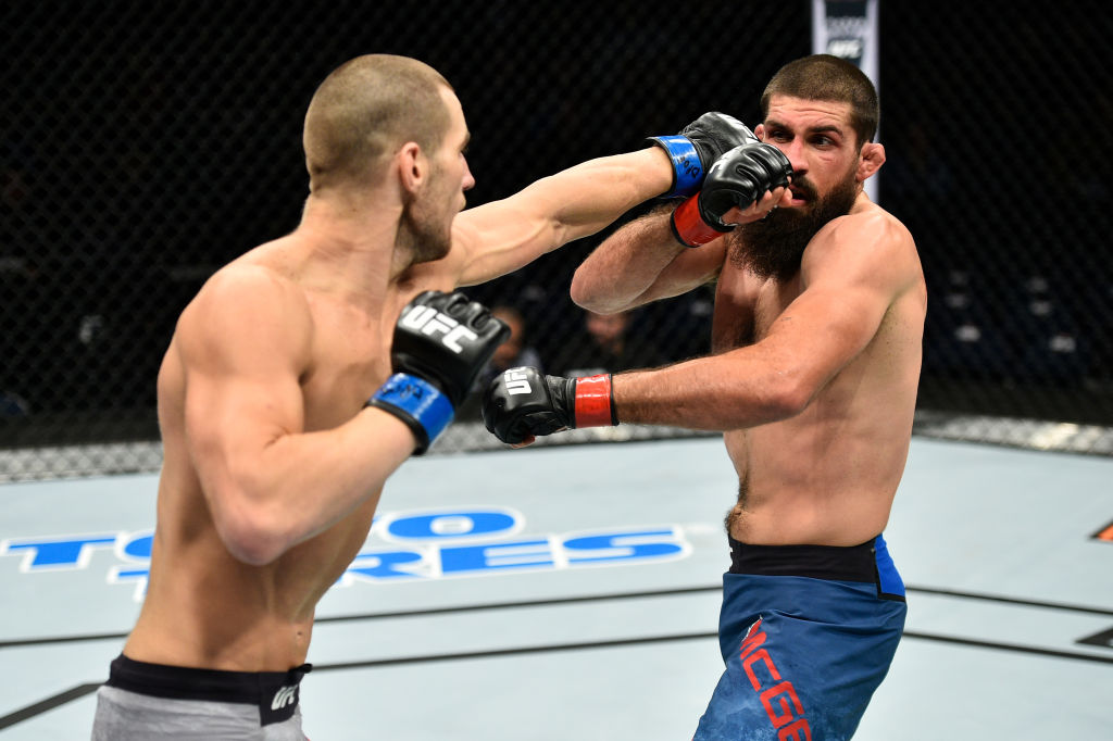 Sean Strickland punches Court McGee in their welterweight bout during the UFC Fight Night event inside the Ted Constant Convention Center on November 11, 2017 in Norfolk, Virginia. (Photo by Brandon Magnus/Zuffa LLC)