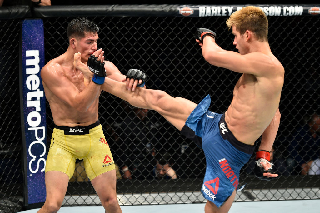 NORFOLK, VA - NOVEMBER 11: (R-L) Sage Northcutt kicks Michel Quinones in their lightweight bout during the UFC Fight Night event inside the Ted Constant Convention Center on November 11, 2017 in Norfolk, Virginia. (Photo by Brandon Magnus/Zuffa LLC)