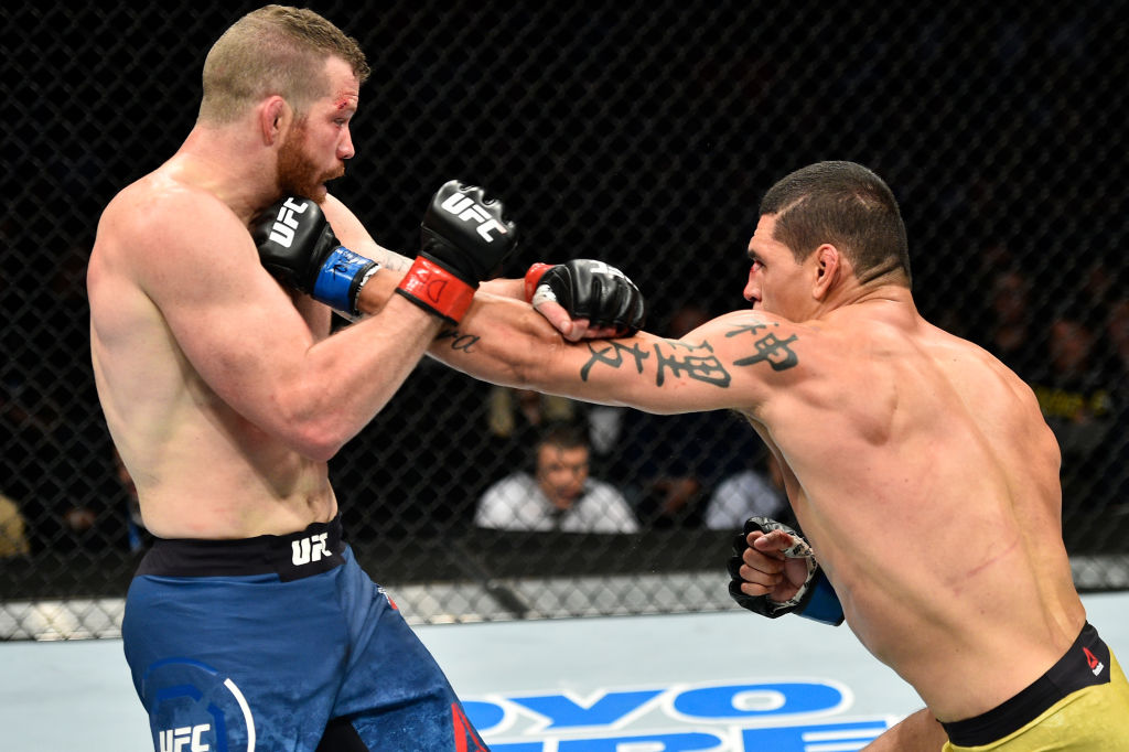 NORFOLK, VA - NOVEMBER 11: (R-L) Cezar Ferreira of Brazil punches Nate Marquardt in their middleweight bout during the UFC Fight Night event inside the Ted Constant Convention Center on November 11, 2017 in Norfolk, Virginia. (Photo by Brandon Magnus/Zuffa LLC)