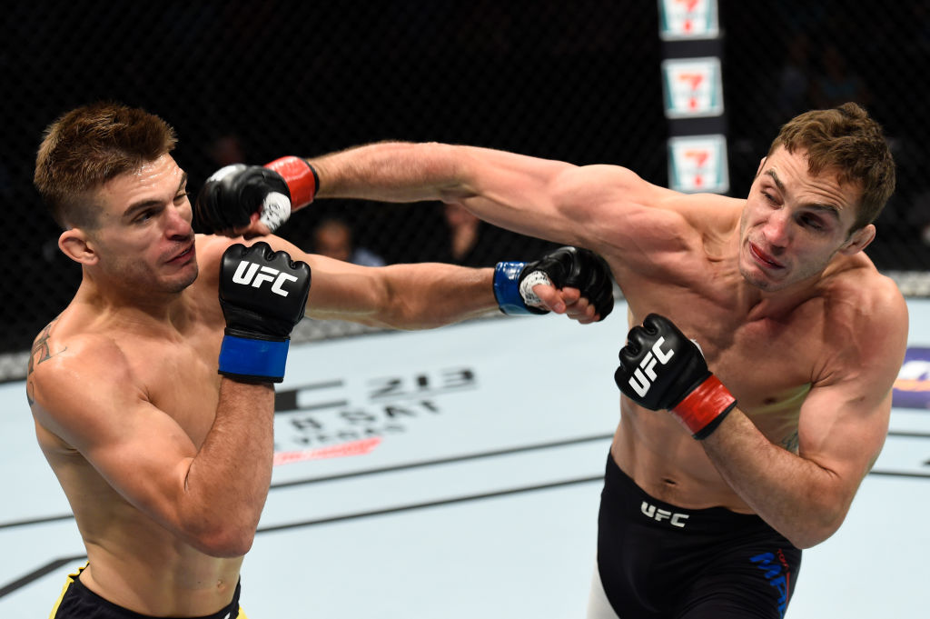 OKLAHOMA CITY, OK - JUNE 25: (R-L) Tony Martin and Johnny Case trade punches in their lightweight bout during the UFC Fight Night event at the Chesapeake Energy Arena on June 25, 2017 in Oklahoma City, Oklahoma. (Photo by Brandon Magnus/Zuffa LLC)