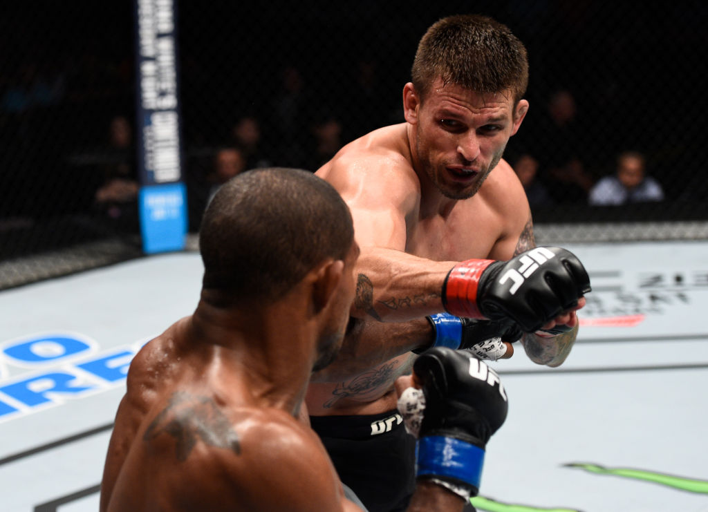 OKLAHOMA CITY, OK - JUNE 25: (R-L) Tim Means punches Alex Garcia of the Dominican Republic in their welterweight bout during the UFC Fight Night event at the Chesapeake Energy Arena on June 25, 2017 in Oklahoma City, Oklahoma. (Photo by Brandon Magnus/Zuffa LLC)