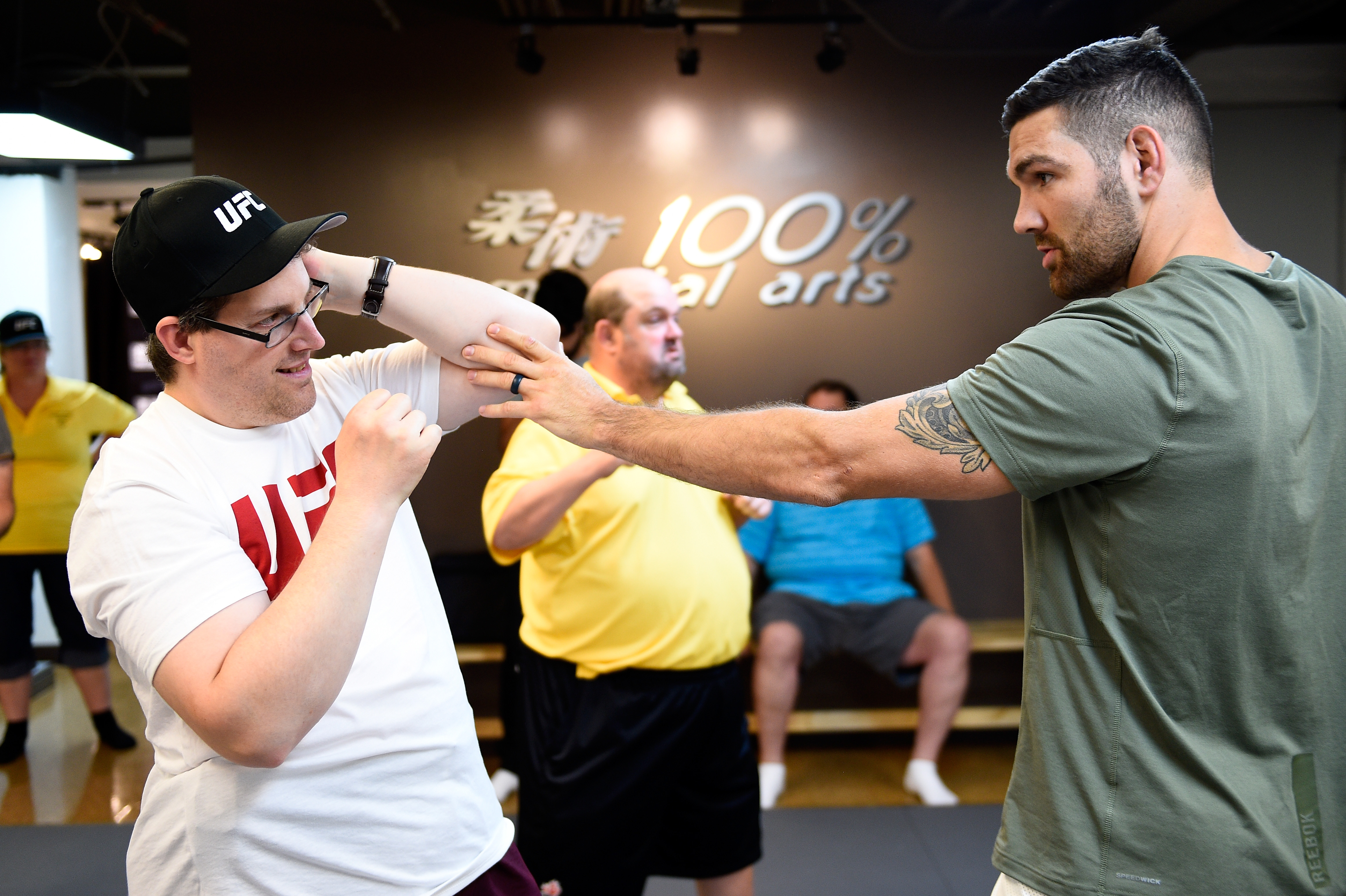OTTAWA, ON - JUNE 16: UFC athletes help lead a mixed martial arts class for Special Olympics athletes during the UFC Fight Night Community Event at the 100% Martial Arts school on June 16, 2016 in Ottawa, Ontario, Canada. UFC will be making a donation to Special Olympics Ontario – Ottawa as part of its We Are All Fighters initiative. (Photo by Jeff Bottari/Zuffa LLC)