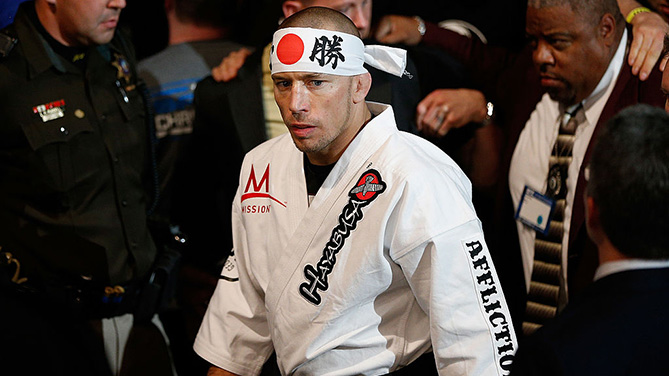 LAS VEGAS, NV - NOVEMBER 16: Georges St-Pierre walks to the Octagon to face Johny Hendricks in their UFC welterweight championship bout during the UFC 167 event inside the MGM Grand Garden Arena on November 16, 2013 in Las Vegas, Nevada. (Photo by Josh Hedges/Zuffa LLC)