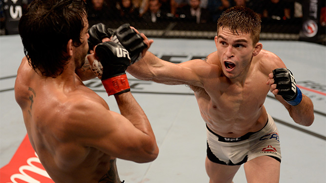 Johnny Case of the United States punches Yan Cabral of Brazil in their lightweight bout during the UFC Fight Night Belfort v Henderson at Ibirapuera Gymnasium on November 7, 2015 in Sao Paulo, Brazil. (Photo by Buda Mendes/Zuffa LLC)