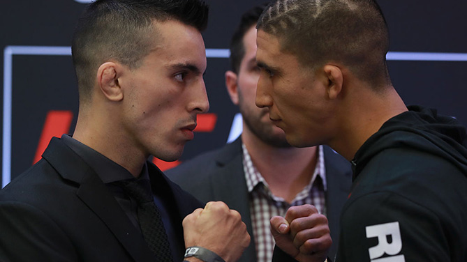 SAO PAULO, BRAZIL - NOV. 17: Bantamweight fighters Thomas Almeida (L) of Brazil and Albert Morales of the United States pose for photographers during Ultimate Media Day at Renaissance Hotel. (Photo by Buda Mendes/Zuffa LLC)