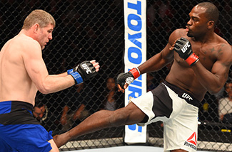 (R-L) Derek Brunson kicks <a href='../fighter/Dan-Kelly'><a href='../fighter/Dan-Kelly'>Daniel Kelly</a></a> of Australia in their middleweight fight during the UFC Fight Night event at the Spark Arena on June 11, 2017 in Auckland, New Zealand. (Photo by Josh Hedges/Zuffa LLC)