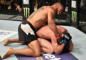 (L-R) Thiago Santos of Brazil punches <a href='../fighter/gerald-meerschaert'><a href='../fighter/gerald-meerschaert'>Gerald Meerschaert</a></a> in their middleweight bout during the UFC 213 event at T-Mobile Arena on July 8, 2017 in Las Vegas, NV (Photo by Jeff Bottari/Zuffa LLC)