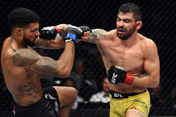 <a href='../fighter/elizeu-zaleski-dos-santos'><a href='../fighter/elizeu-zaleski-dos-santos'>Elizeu Zaleski dos Santos</a></a> of Brazil punches <a href='../fighter/max-griffin'><a href='../fighter/max-griffin'>Max Griffin</a></a> in their welterweight bout during the UFC Fight Night event inside the Ibirapuera Gymnasium on October 28, 2017 in Sao Paulo, Brazil. (Photo by Josh Hedges/Zuffa LLC)