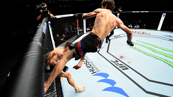 ROTTERDAM, NETHERLANDS - SEPTEMBER 02: (R-L) Zabit Magomedsharipov of Russia lands a kick to the head of Mike Santiago in their featherweight bout during the UFC Fight Night event at the Rotterdam Ahoy on September 2, 2017 in Rotterdam, Netherlands. (Photo by Josh Hedges/Zuffa LLC)